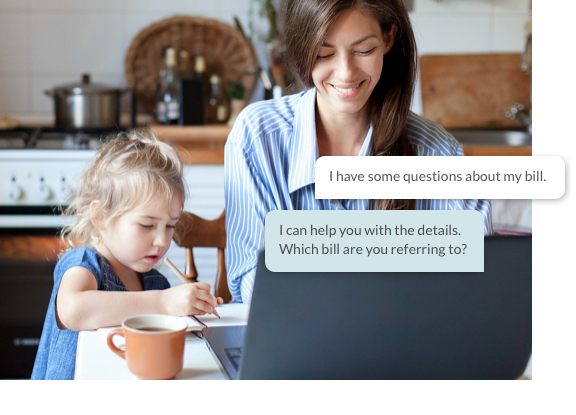 Working mom on a laptop and her daughter doing schoolwork